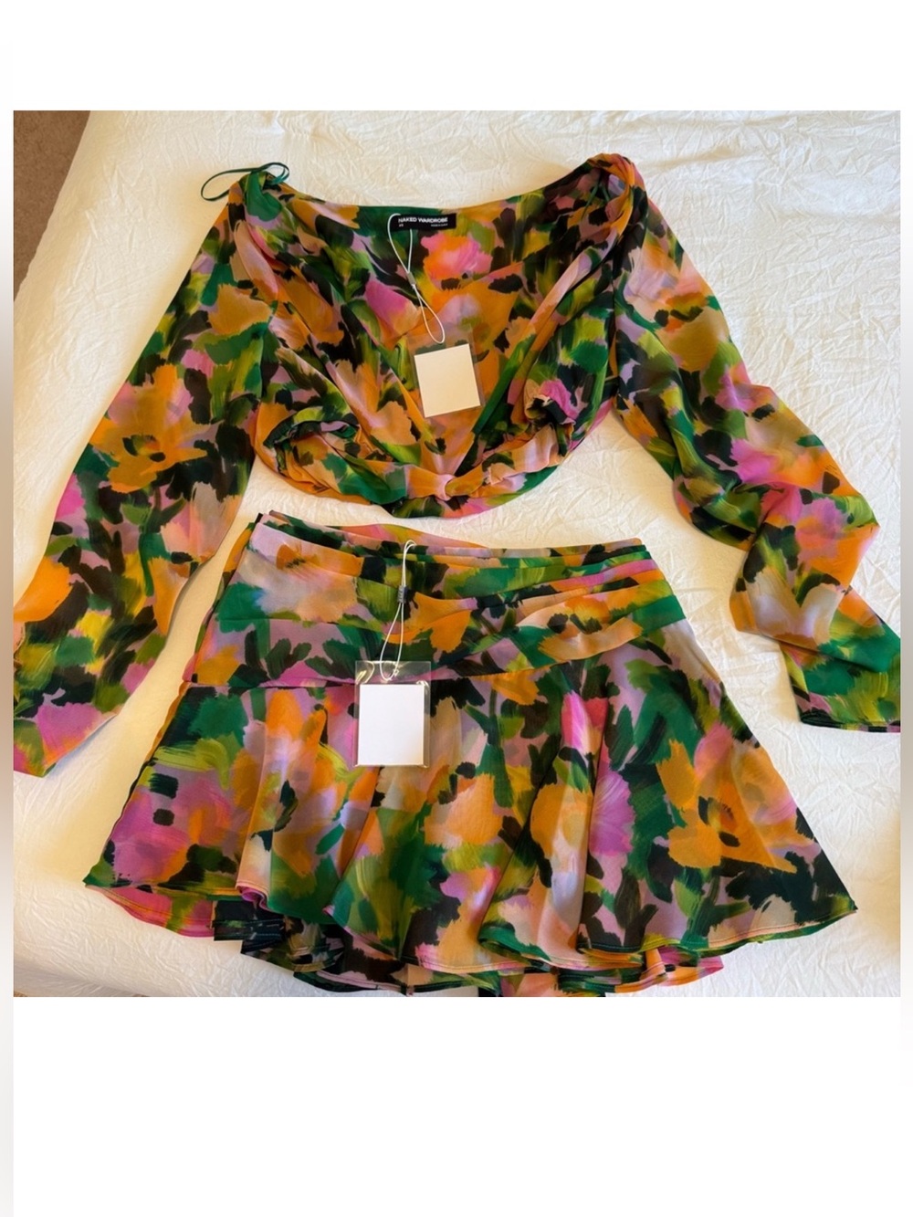 Naked wardrobe set 
Two-Piece Floral Print Crop Top & Skirt Set